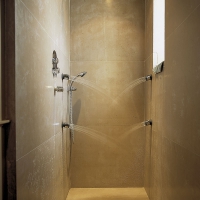 Installation of Walk-in Shower With Grand Antique Natural Stone Slabs